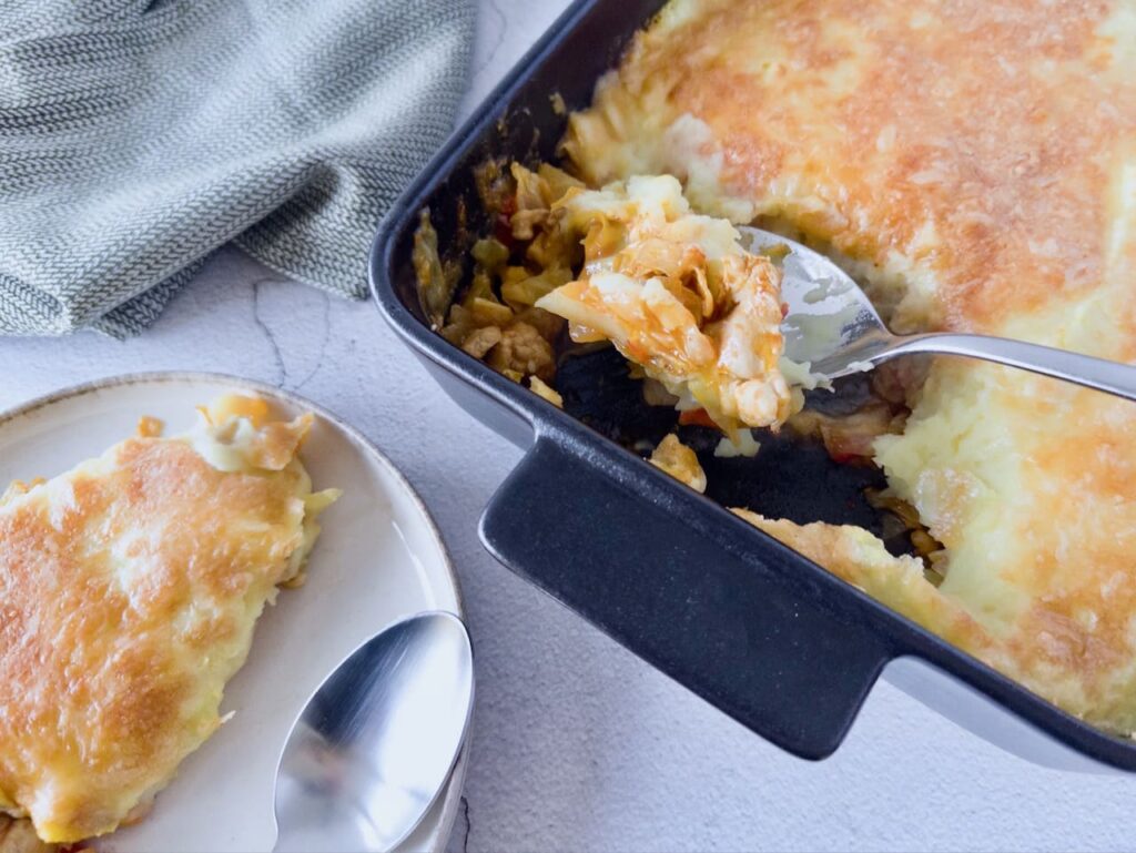 Kip met spitskool ovenschotel