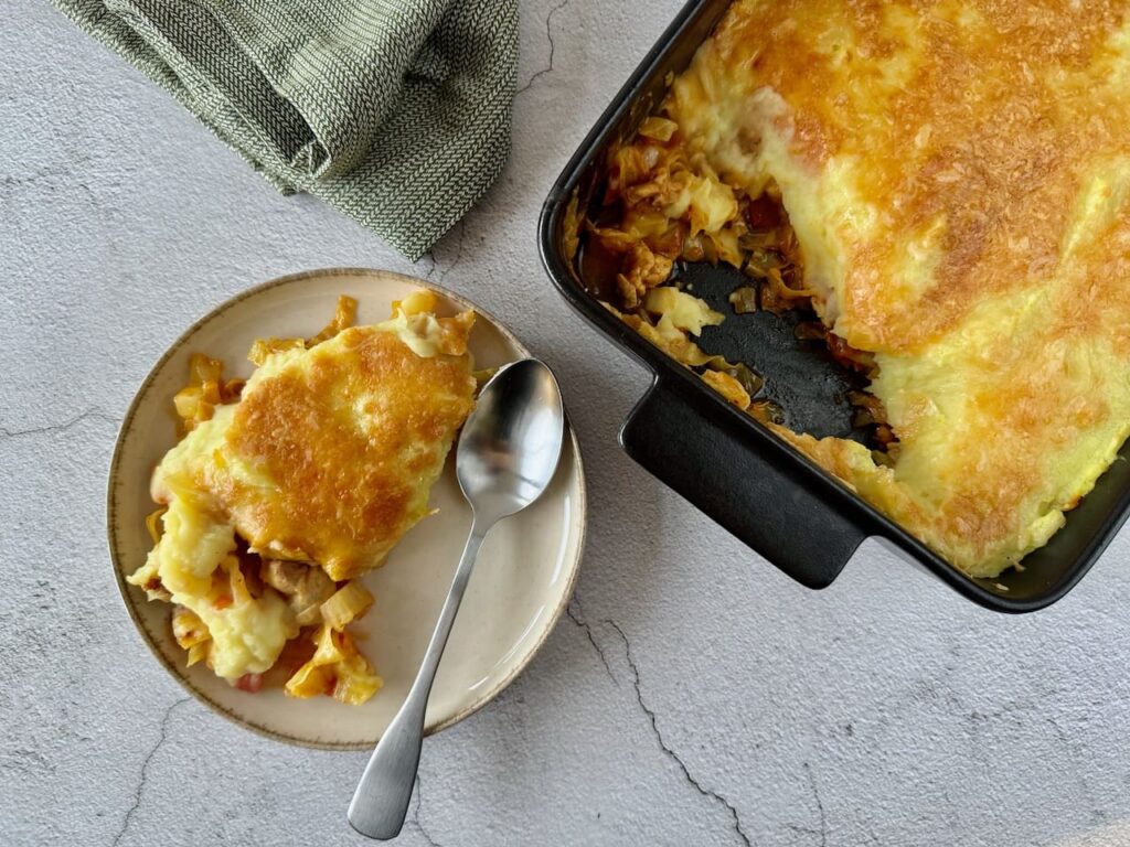 Kip met spitskool ovenschotel